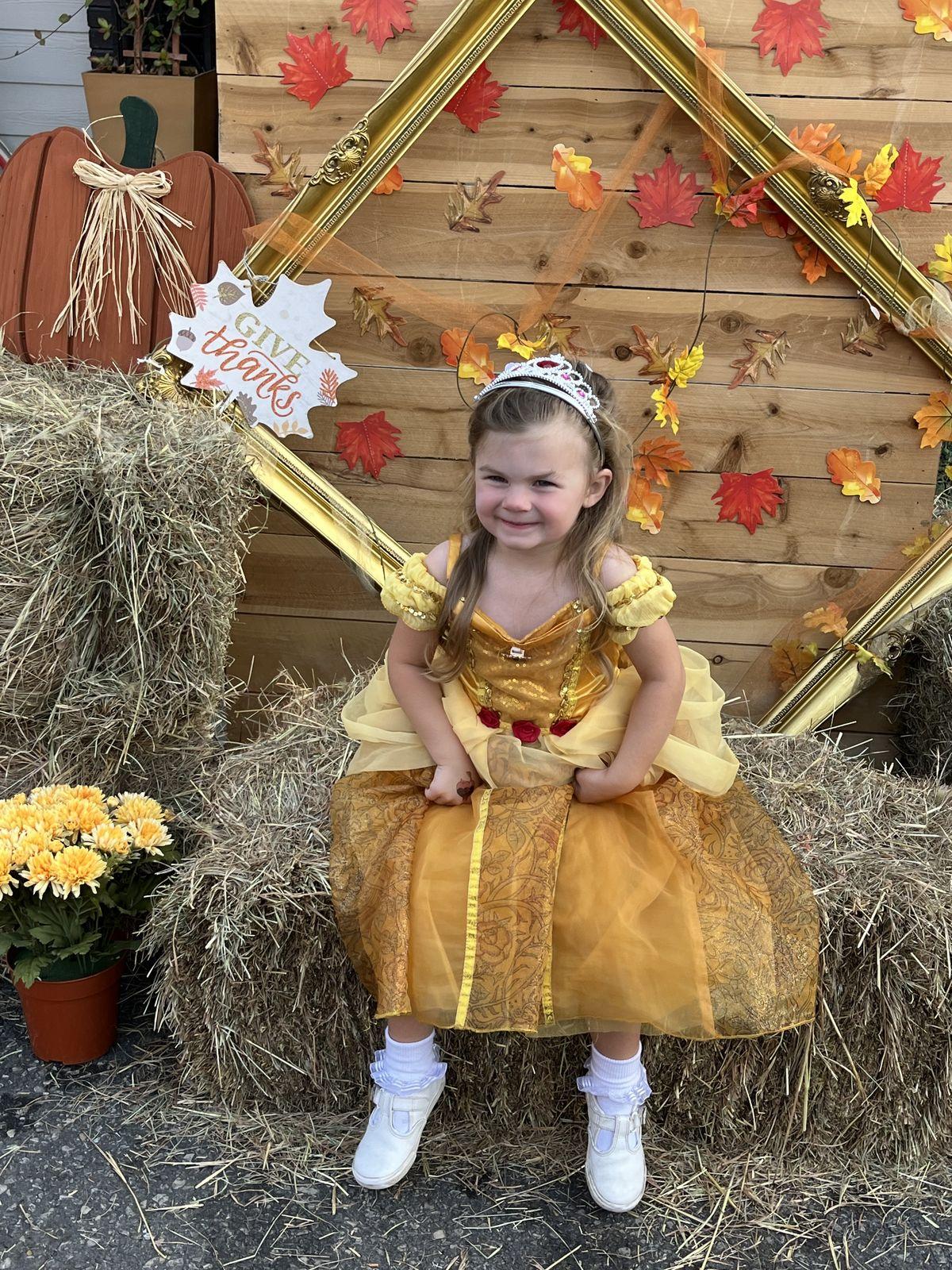 Girl in princess costume at photo booth