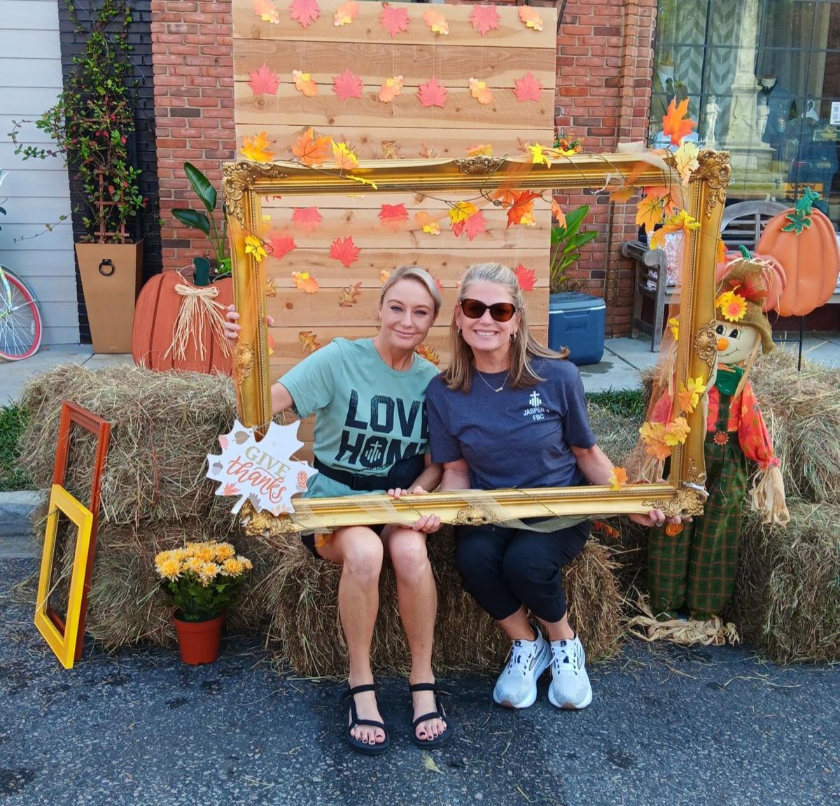 Photo booth with friends at fall fest